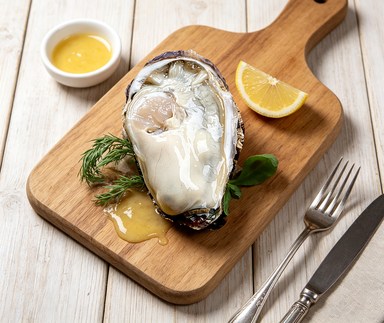 Fresh Raw Oyster with Aromatic Garnishes